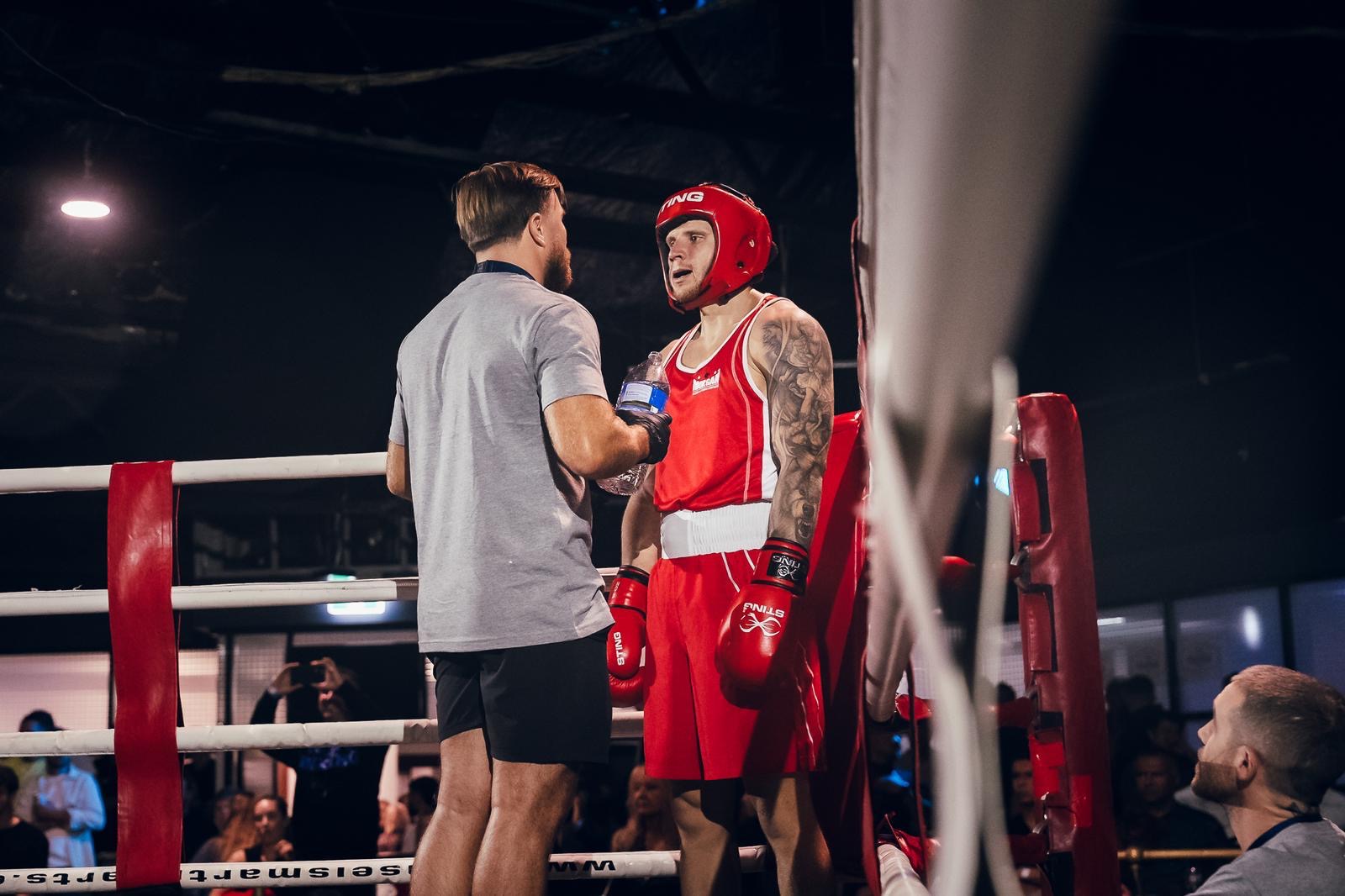 Between rounds in the corner